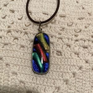 Colorful glittery handmade pendant Rasta colors